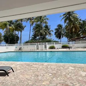 https://relaxing-beach-condo-5-mins-from-airport.greaterantilleshotels.net